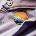 professionnal photography of a pin badge on a shirt, realistic